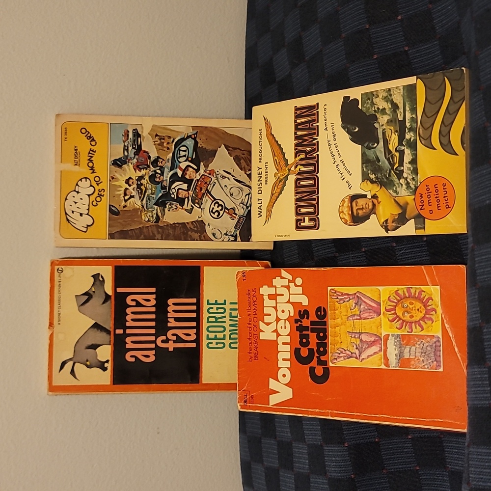 4 classics.  paperbacks. vintage.